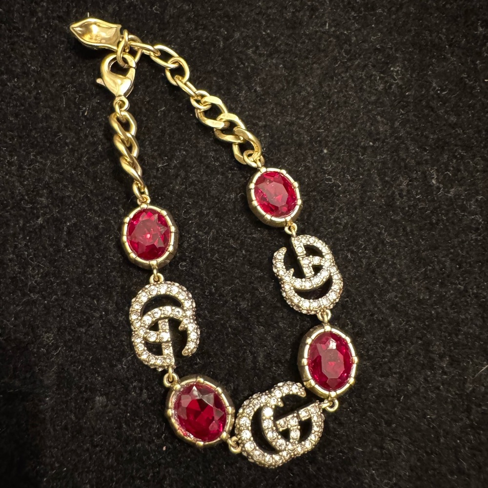 Gucci Gold Bracelet with Red and Silver Accents
